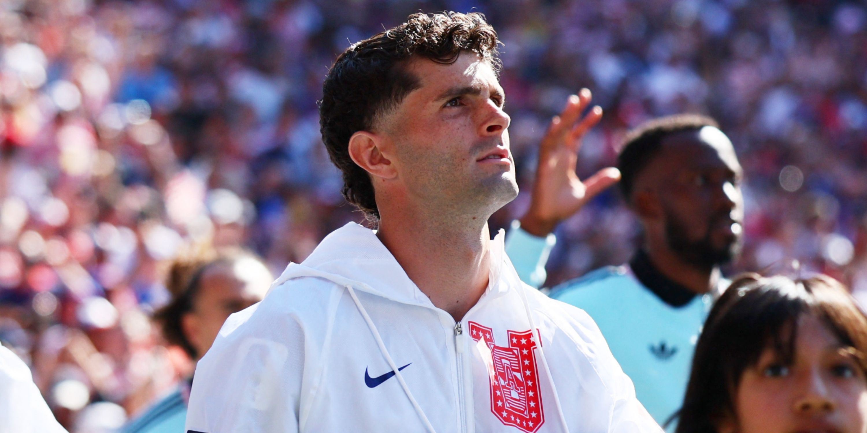 Christian Pulisic of the U.S. walks out before the start of the match vs Belgium