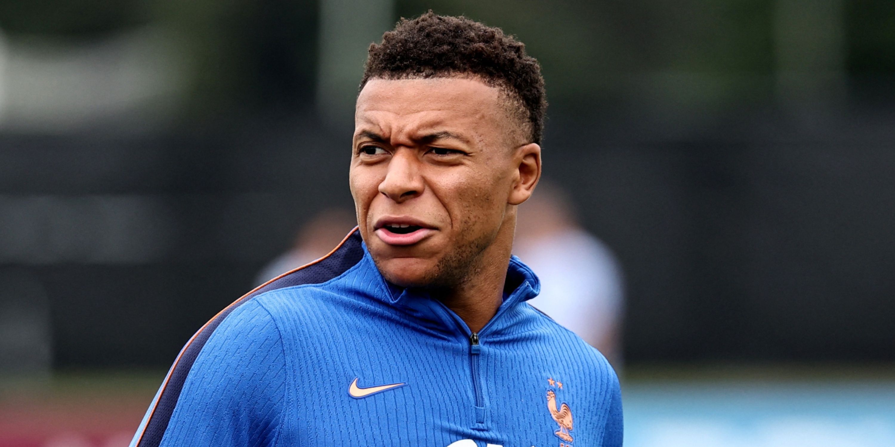 France's Kylian Mbappe looks baffled during training