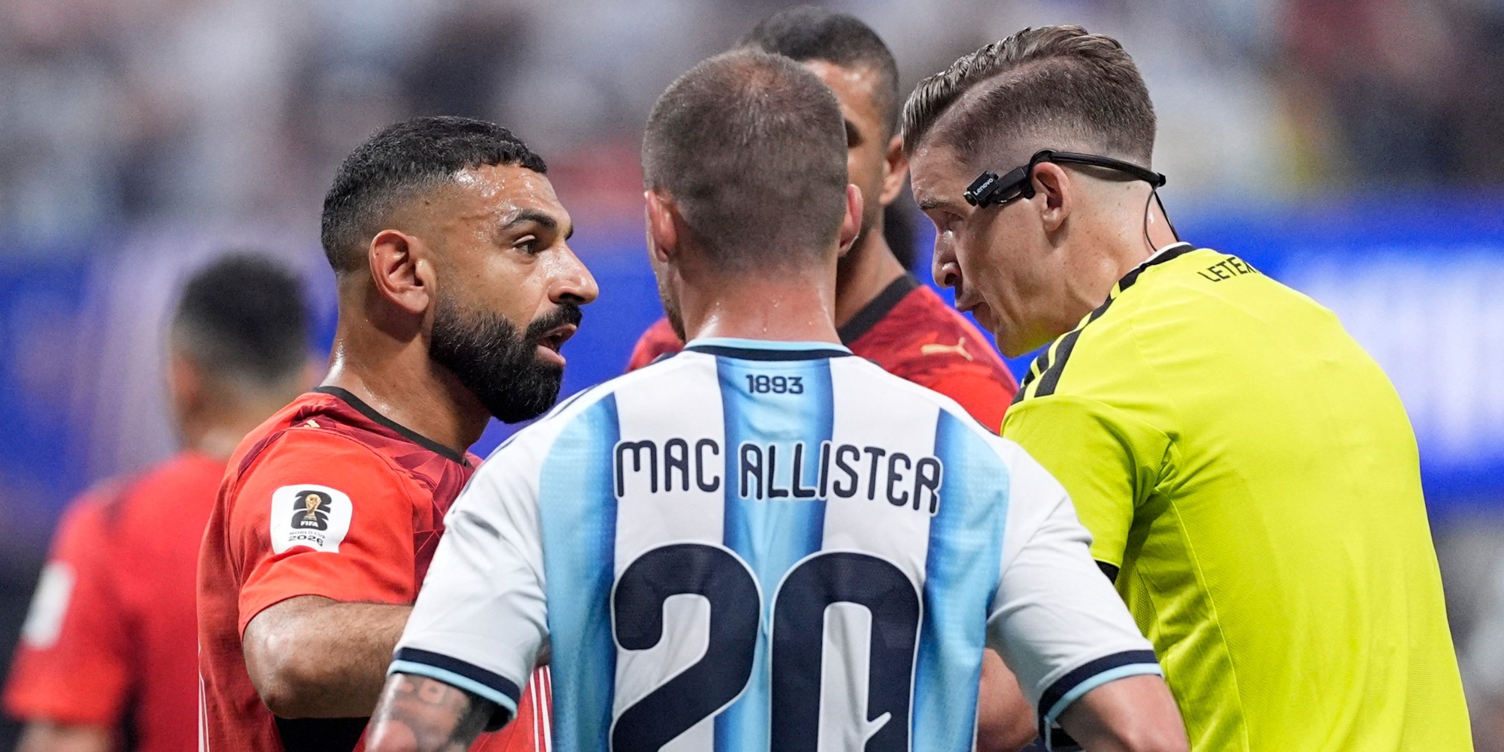 Egypt's Mohamed Salah remonstrates with referee Francois Letexier after Argentina are awarded a penalty