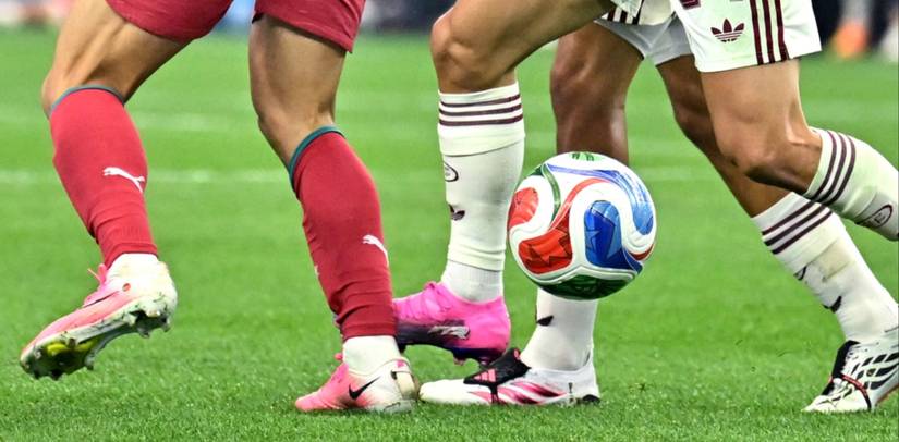 Portugal's Pedro Neto in action with Spain's Marc Cucurella
