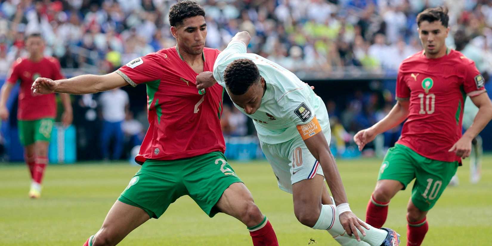 Kylian Mbappe and Achraf Hakimi during France vs Morocco