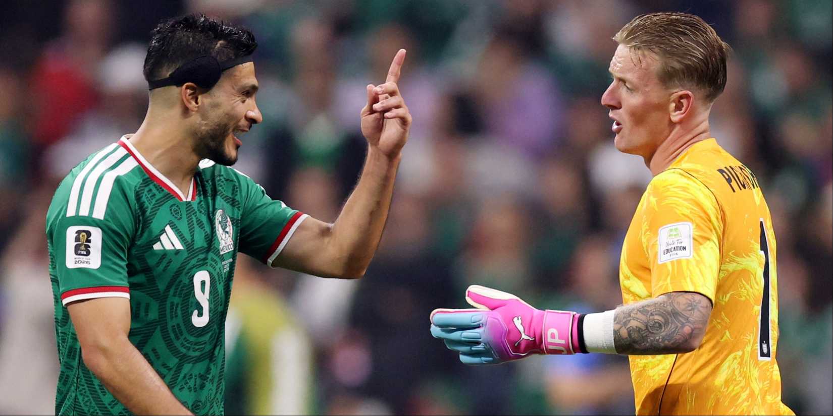 Raul Jimenez (Mexico) and Jordan Pickford (England)