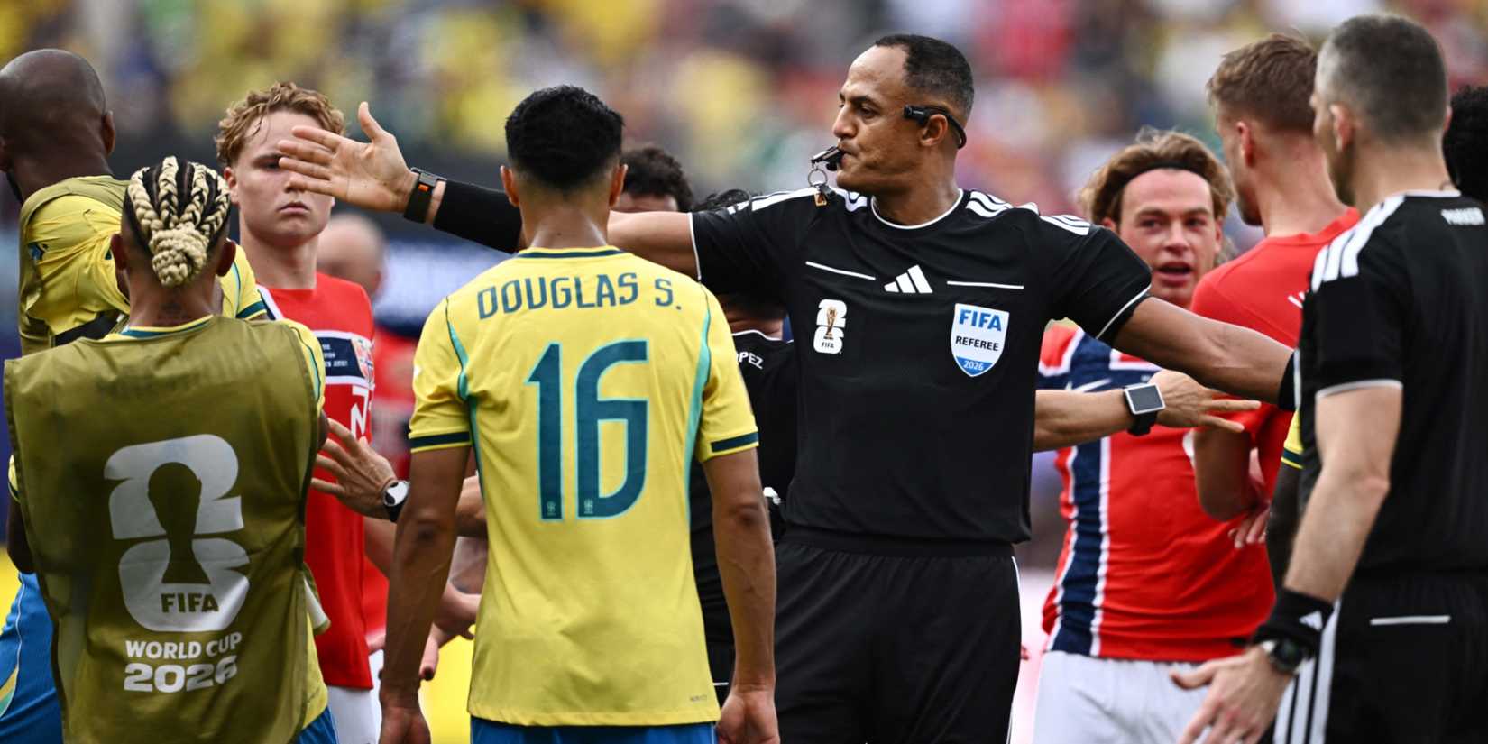  Referee Ismail Elfath reacts as Brazil are awarded a penalty