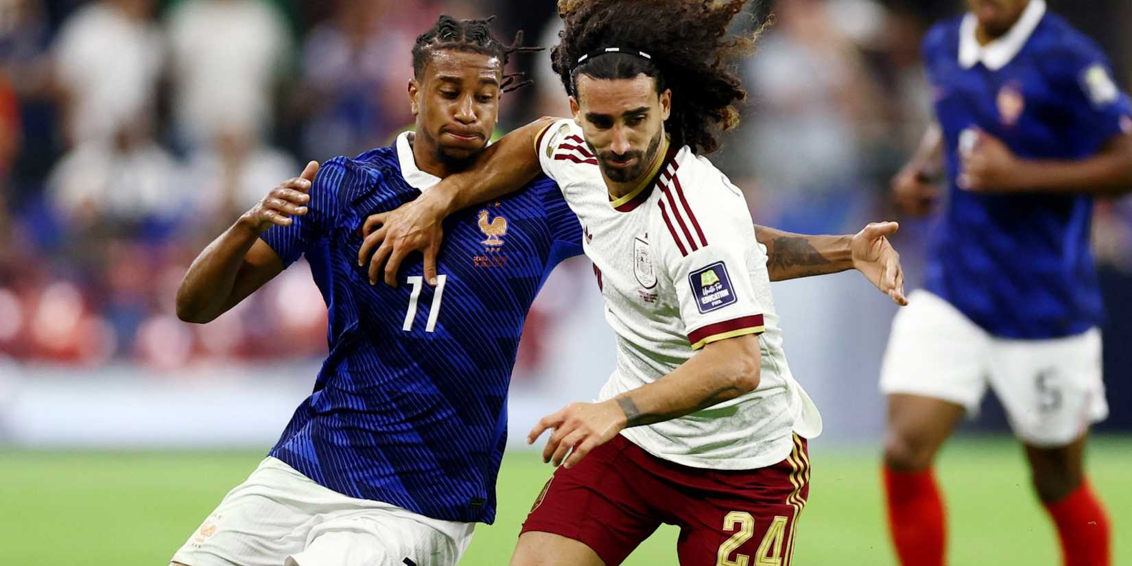 Michael Olise and Marc Cucurella during France vs Spain