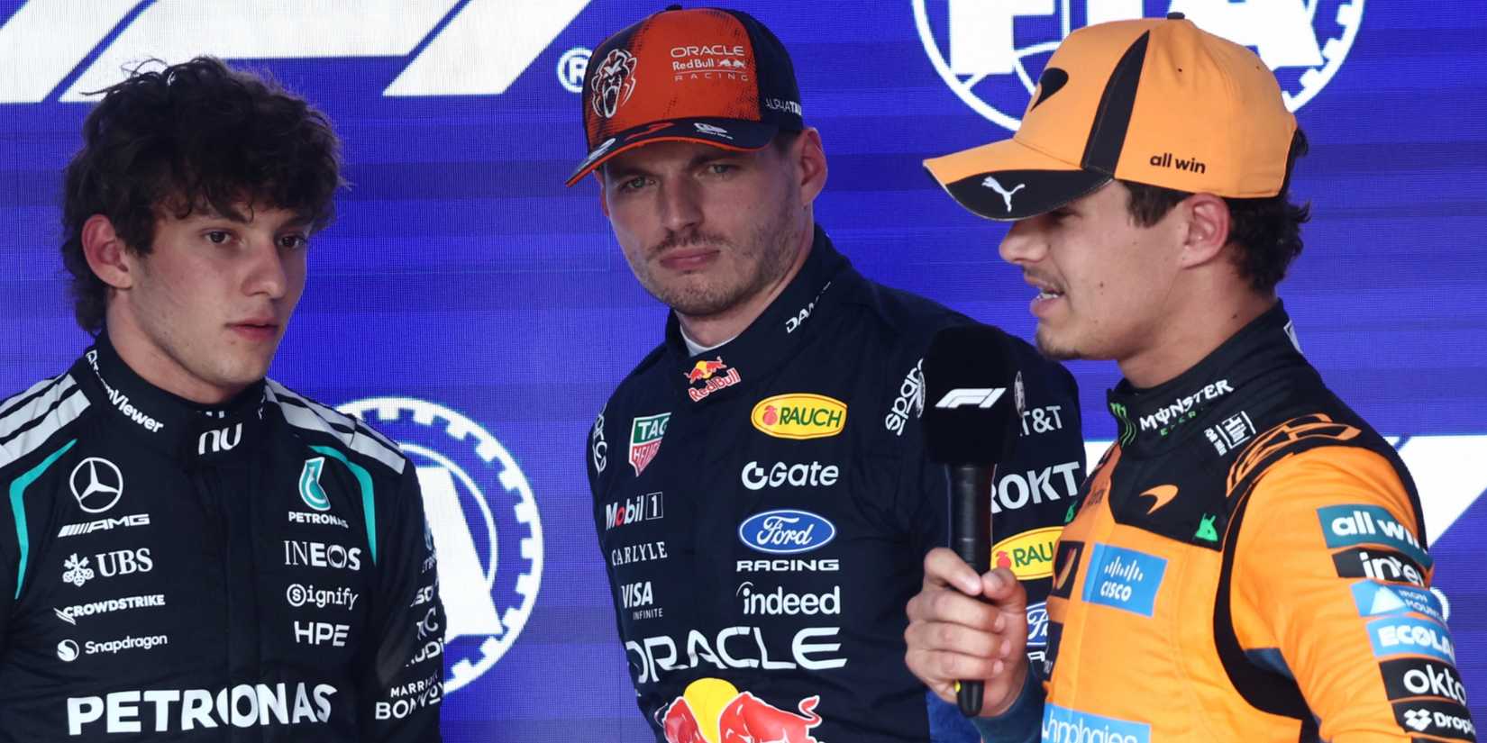 Kimi Antonelli celebrates after qualifying in pole position with second placed Red Bull's Max Verstappen and third placed McLaren's Lando Norris