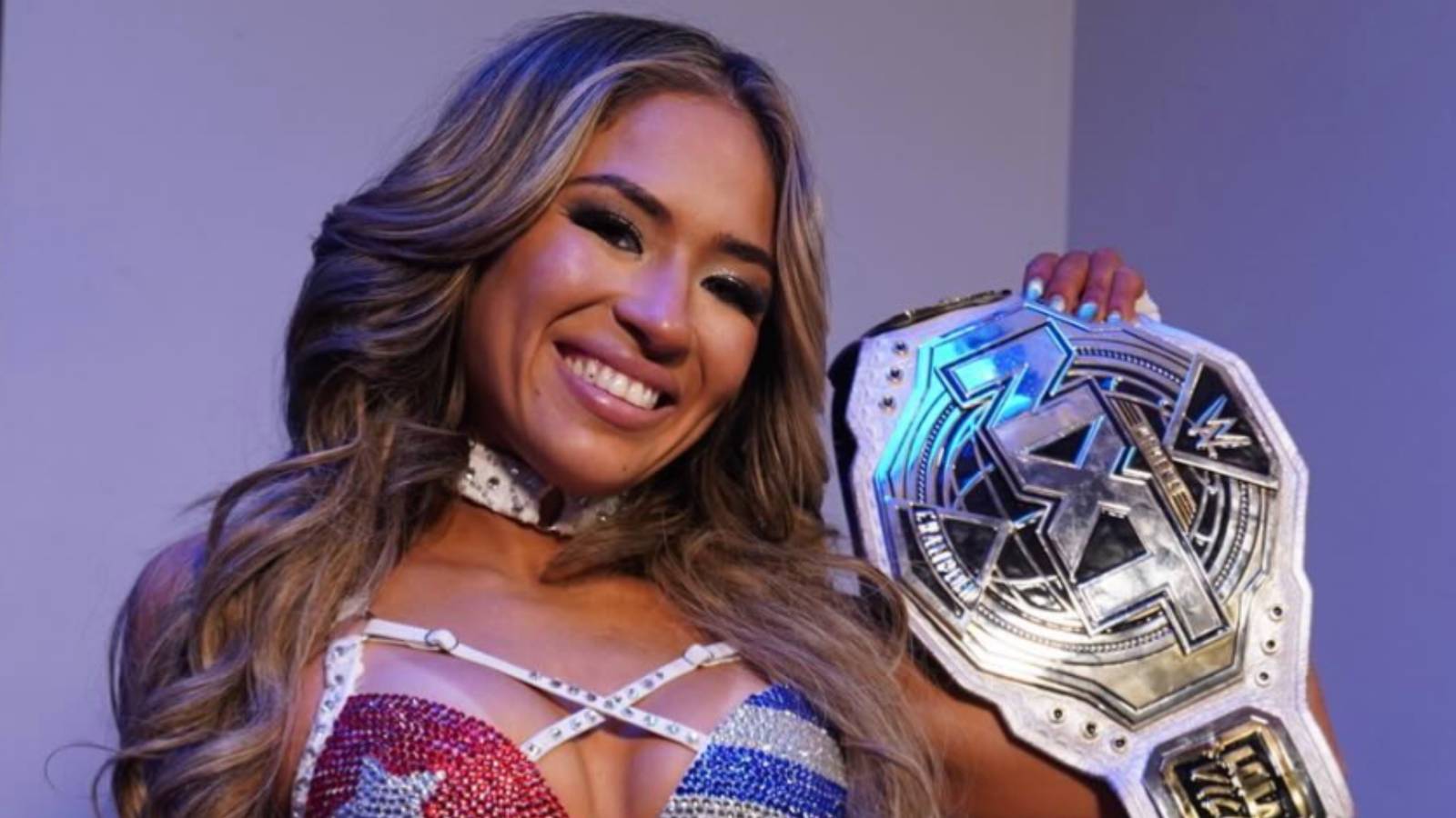 WWE: Lola Vice Posts Naked Photo of Herself With Two Titles