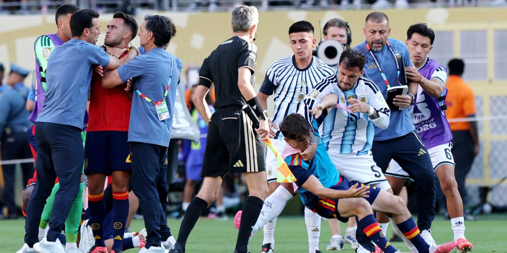 Argentina's Leandro Paredes clashes with Spain's Gavi after the match