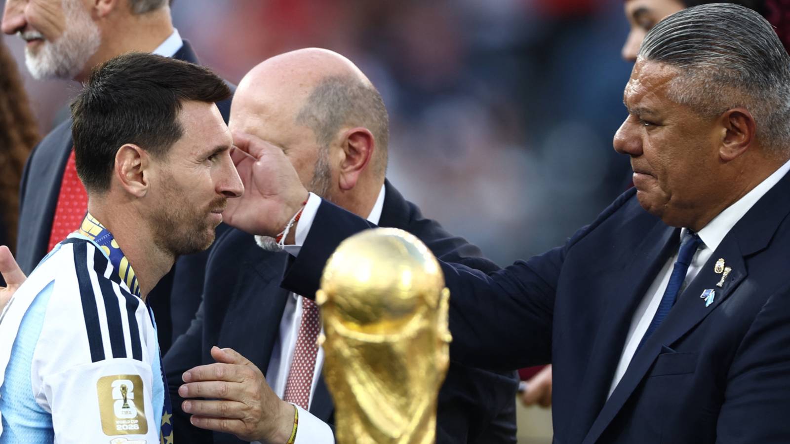 Argentina's Lionel Messi with Argentine Football Association President Claudio Tapia during the trophy presentation