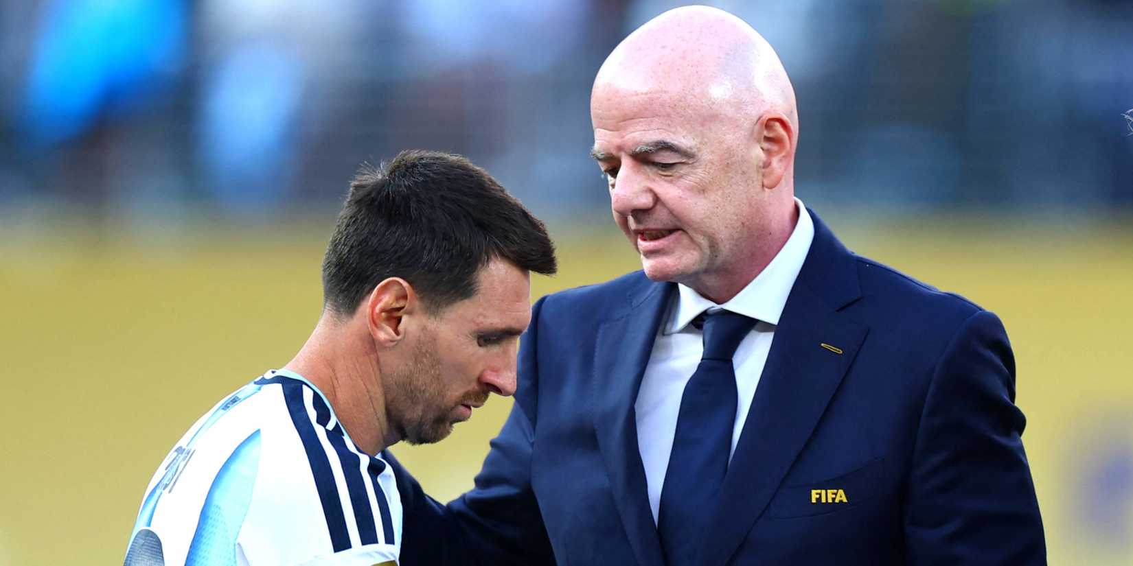 Argentina's Lionel Messi with FIFA president Gianni Infantino after losing the World Cup final