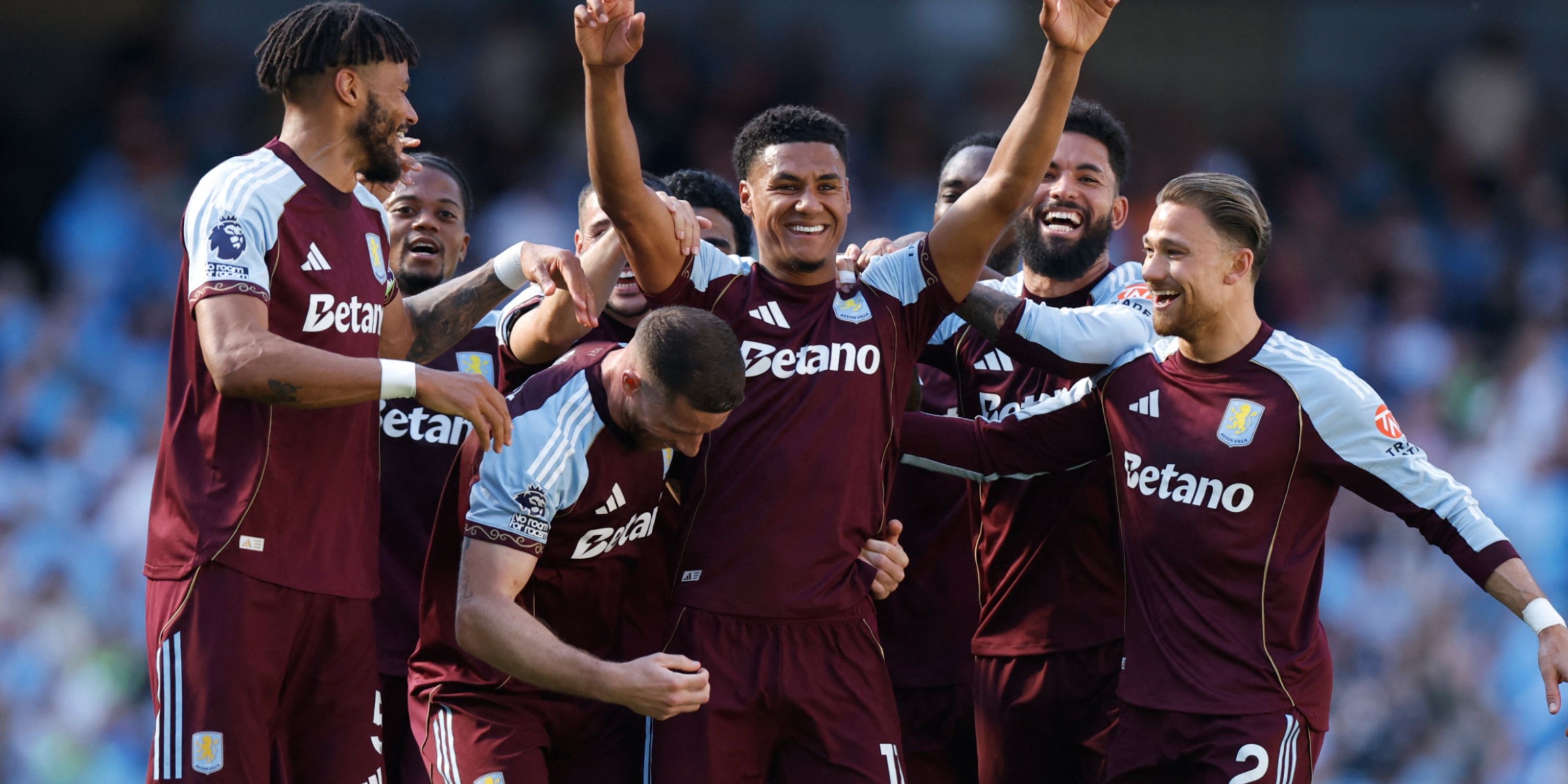 Aston Villa players celebrate with Ollie Watkins