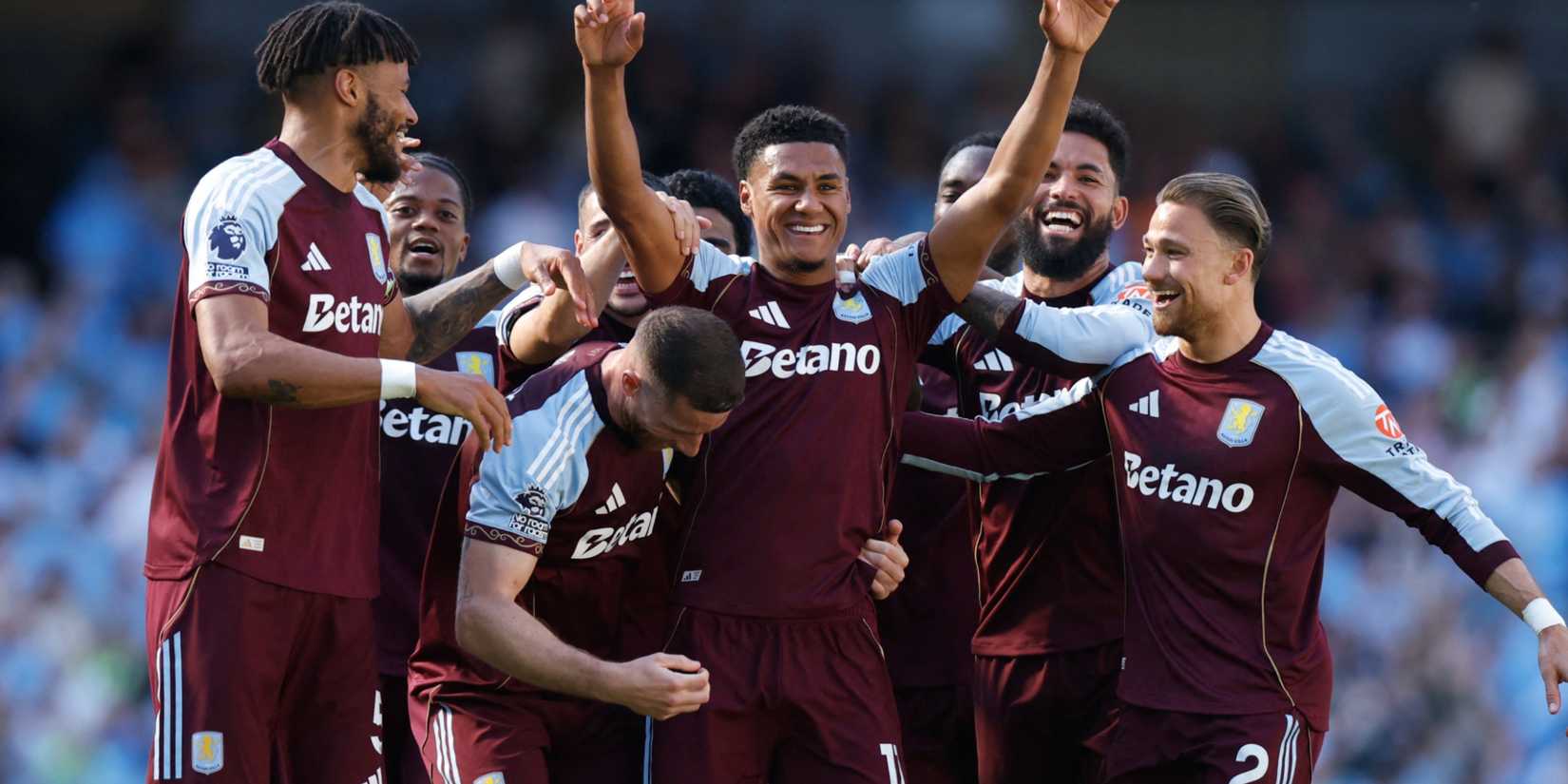 Aston Villa players celebrate with Ollie Watkins