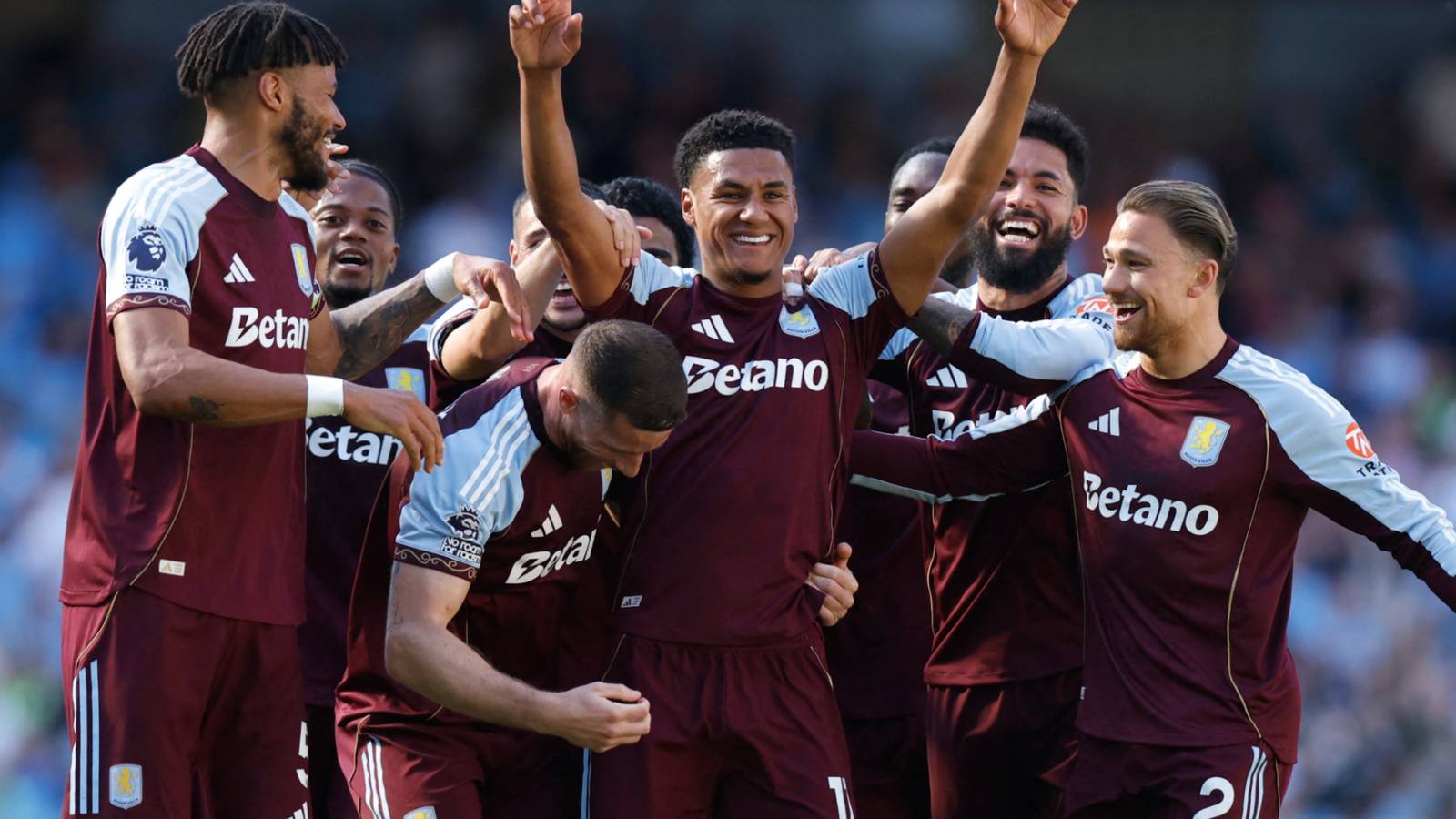 Aston Villa players celebrate with Ollie Watkins