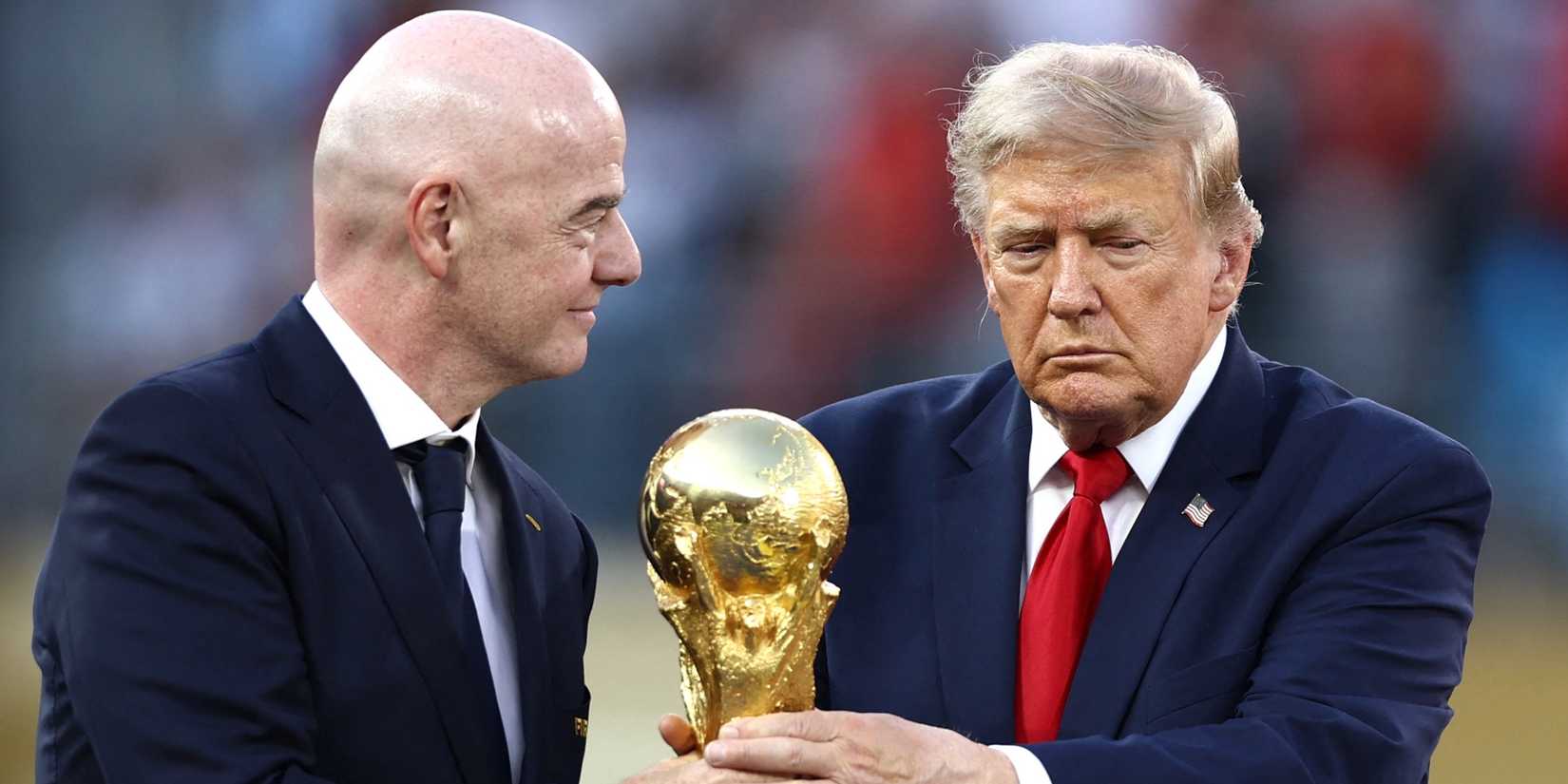 U.S. President Donald Trump and FIFA President Gianni Infantino with the World Cup trophy