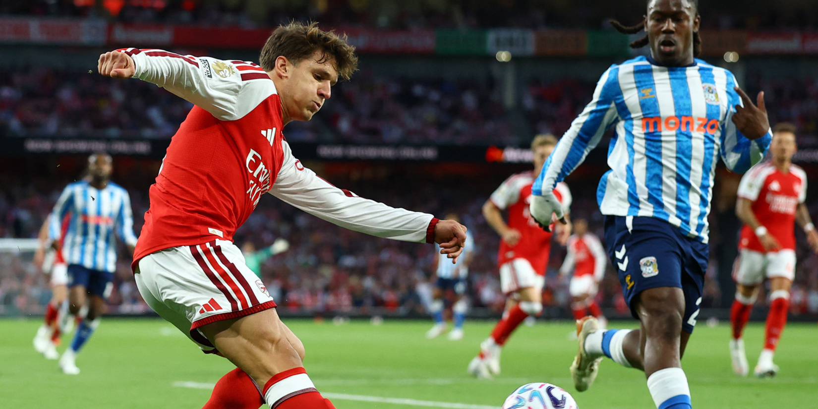 Arsenal's Christos Tzolis in action 