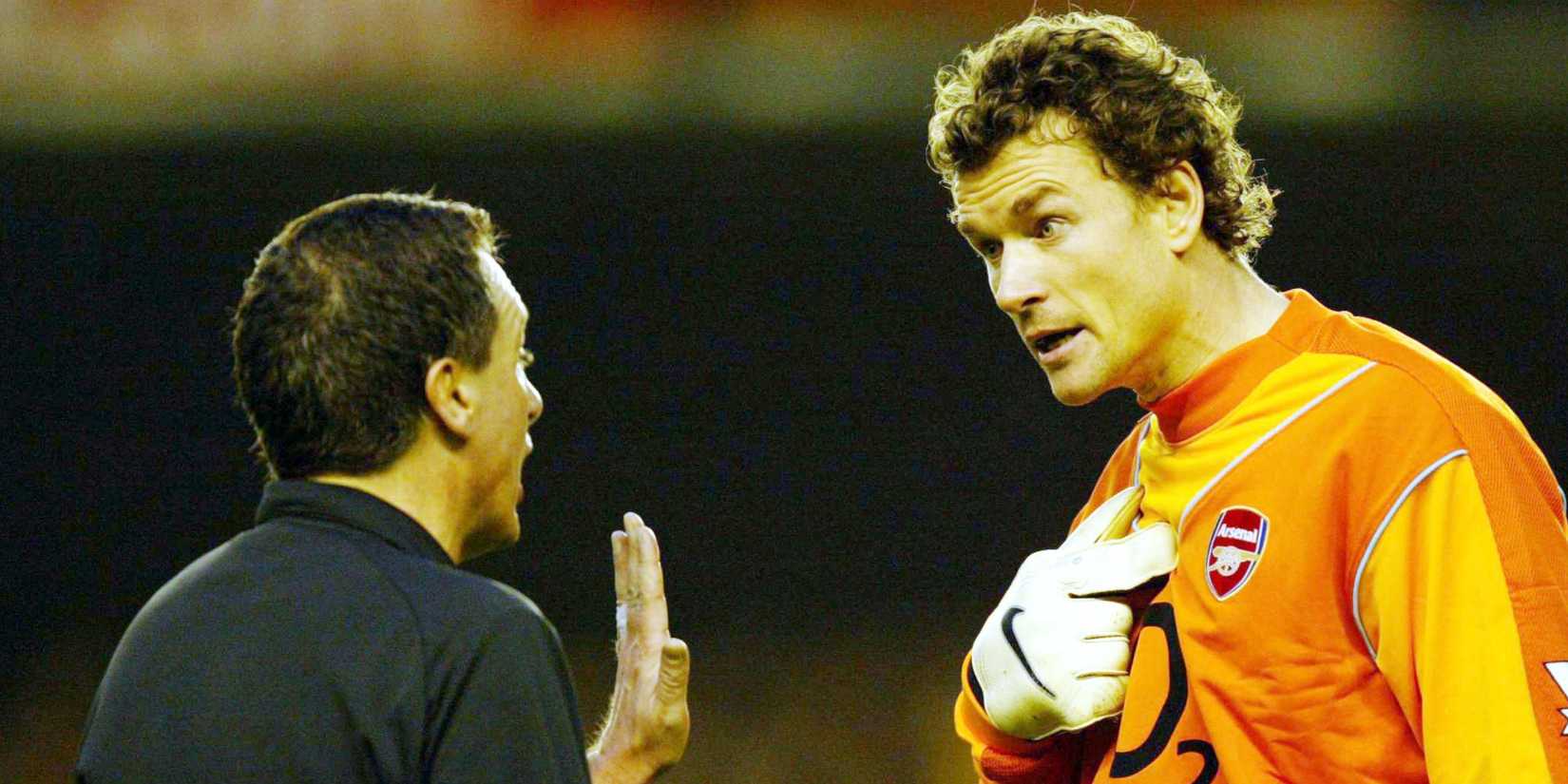 Arsenal's Jens Lehmann in discussion with the referee