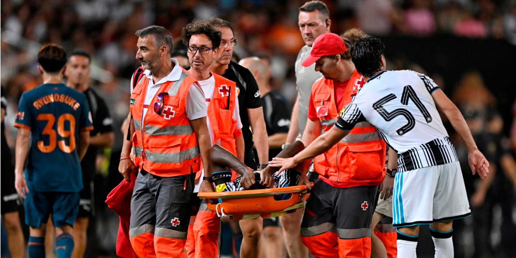 Newcastle United's Anthony Elanga is stretchered off after sustaining an injury during the match