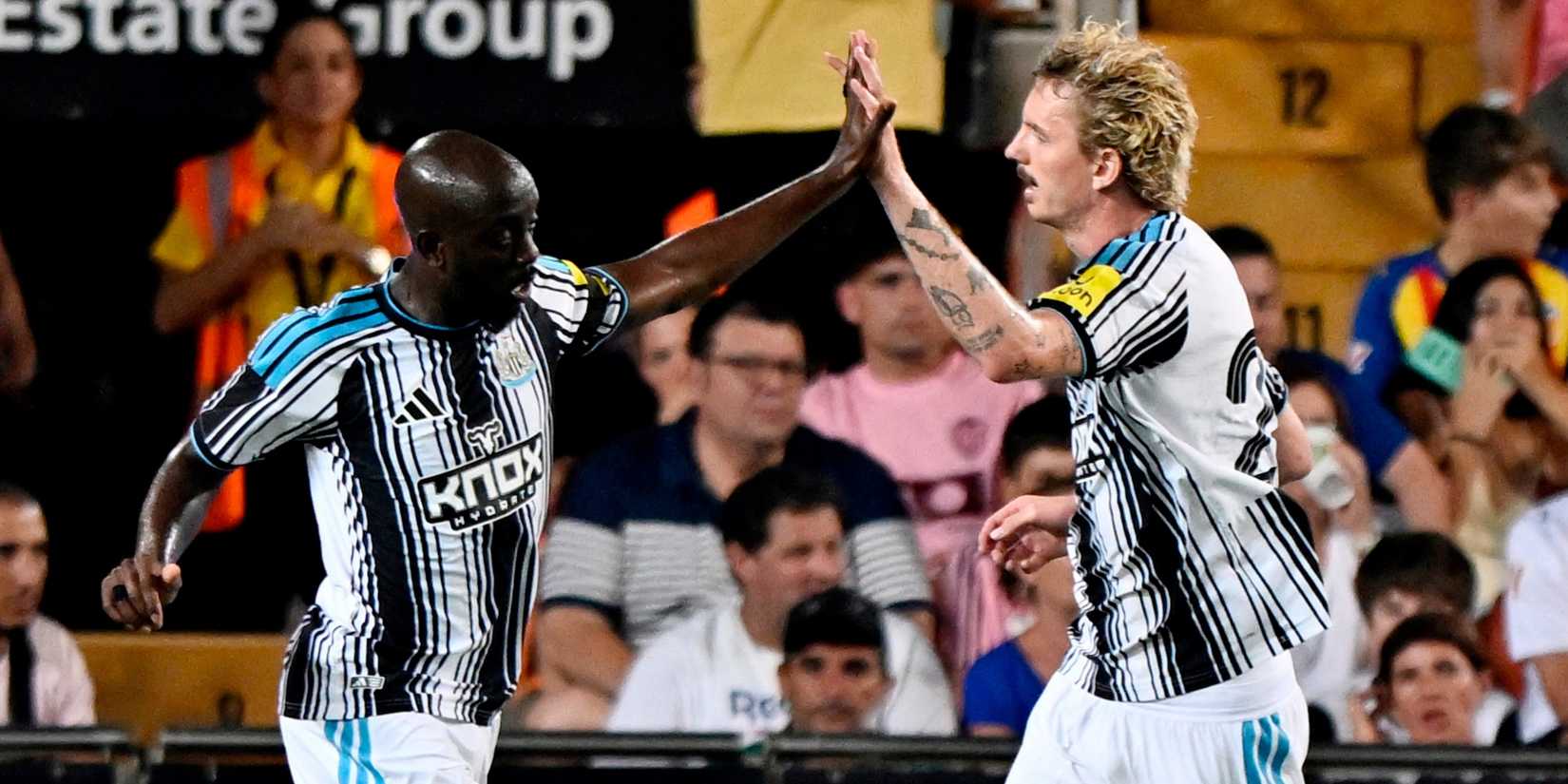 Newcastle United's Yoane Wissa celebrates with Nick Woltemade after scoring their first goa