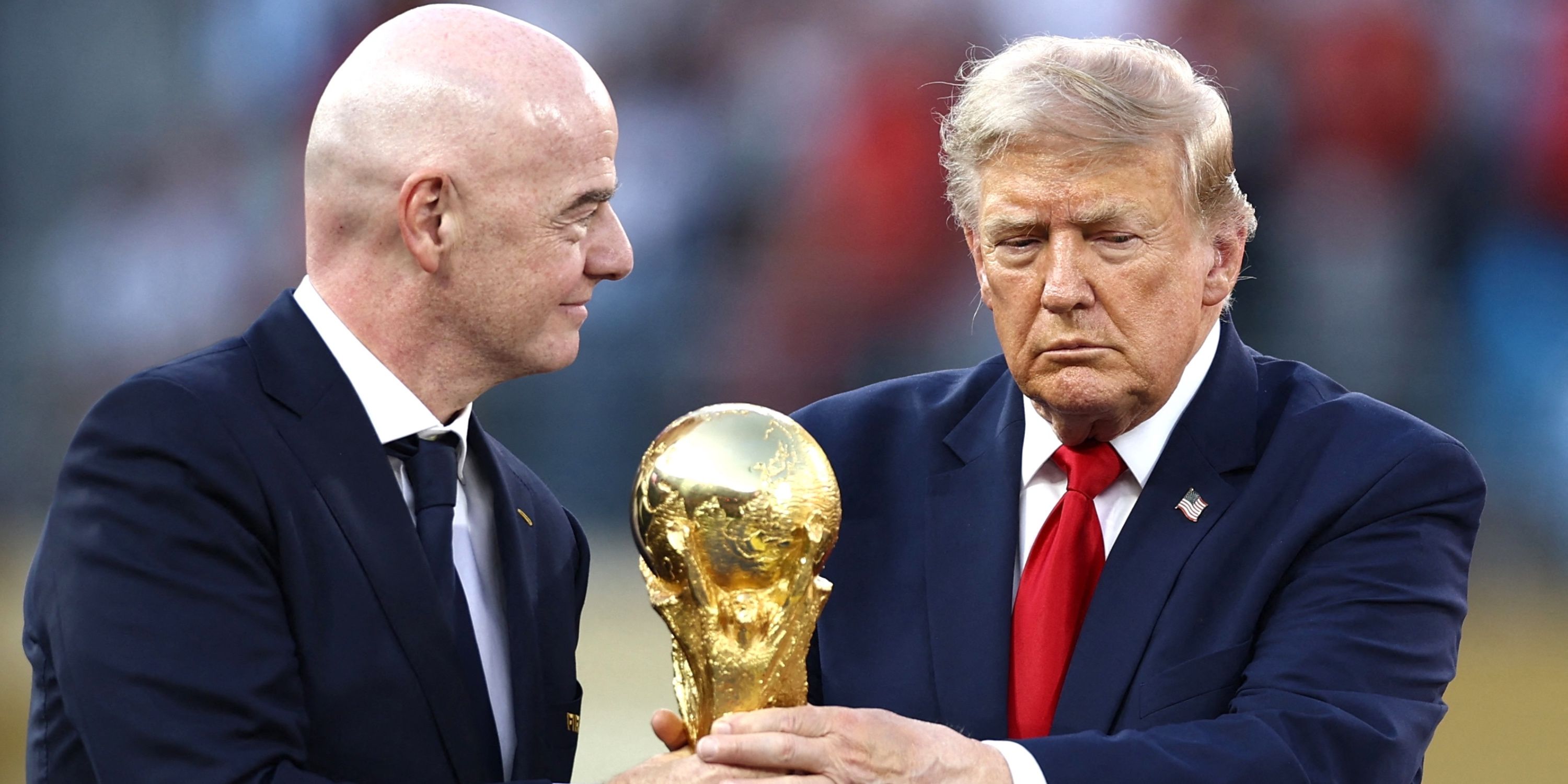 U.S. President Donald Trump and FIFA President Gianni Infantino with the World Cup trophy during the trophy presentatio