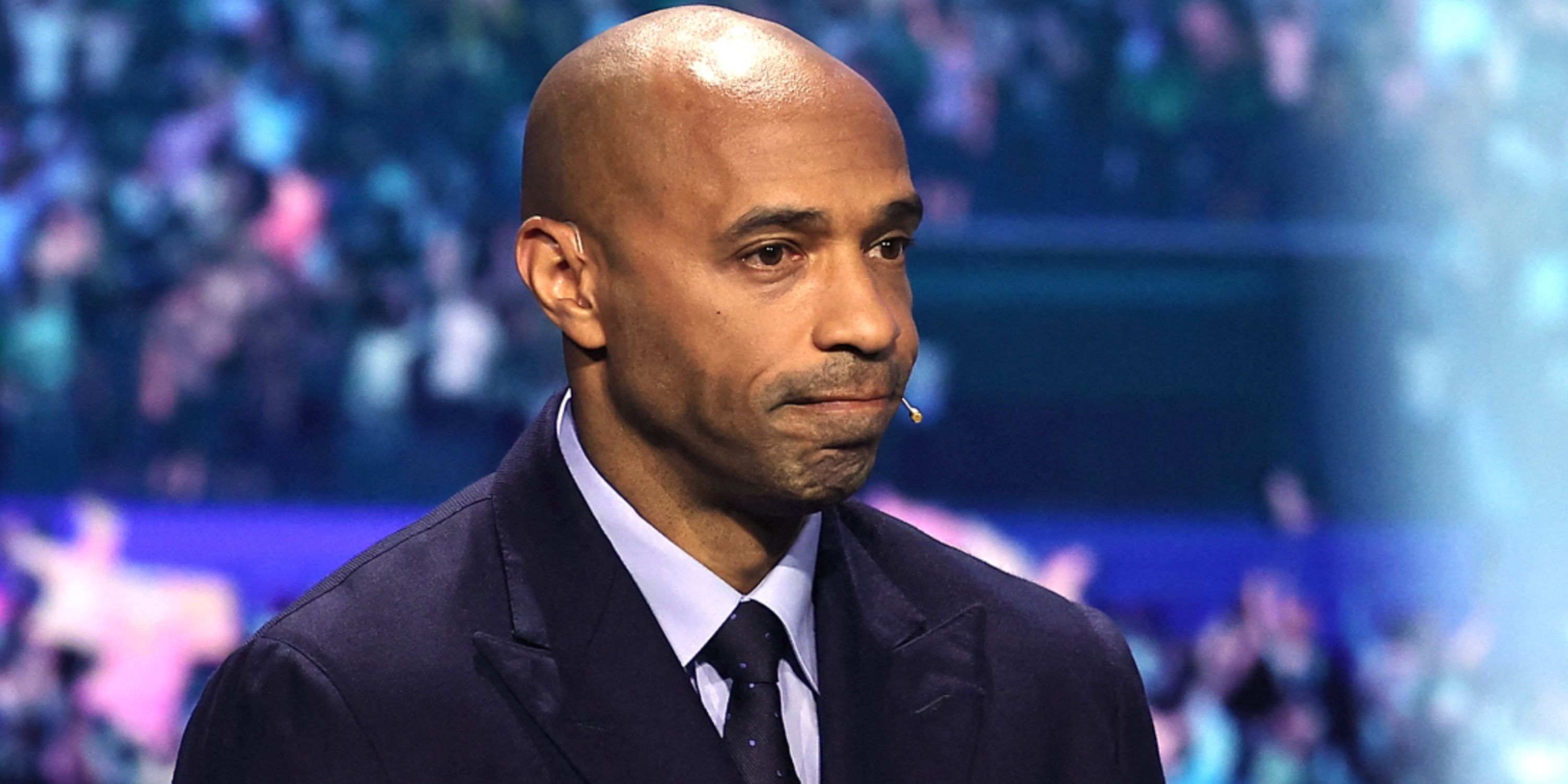 Thierry Henry Burns Tottenham Fan Presenter During Champions League Event