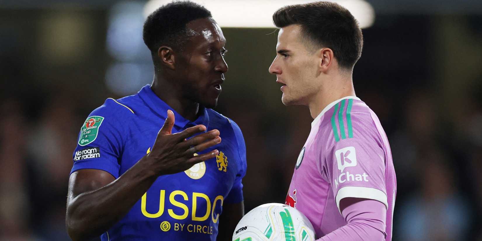 Chelsea striker Danny Welbeck speaks with Leeds United goalkeeper Michael Zetterer
