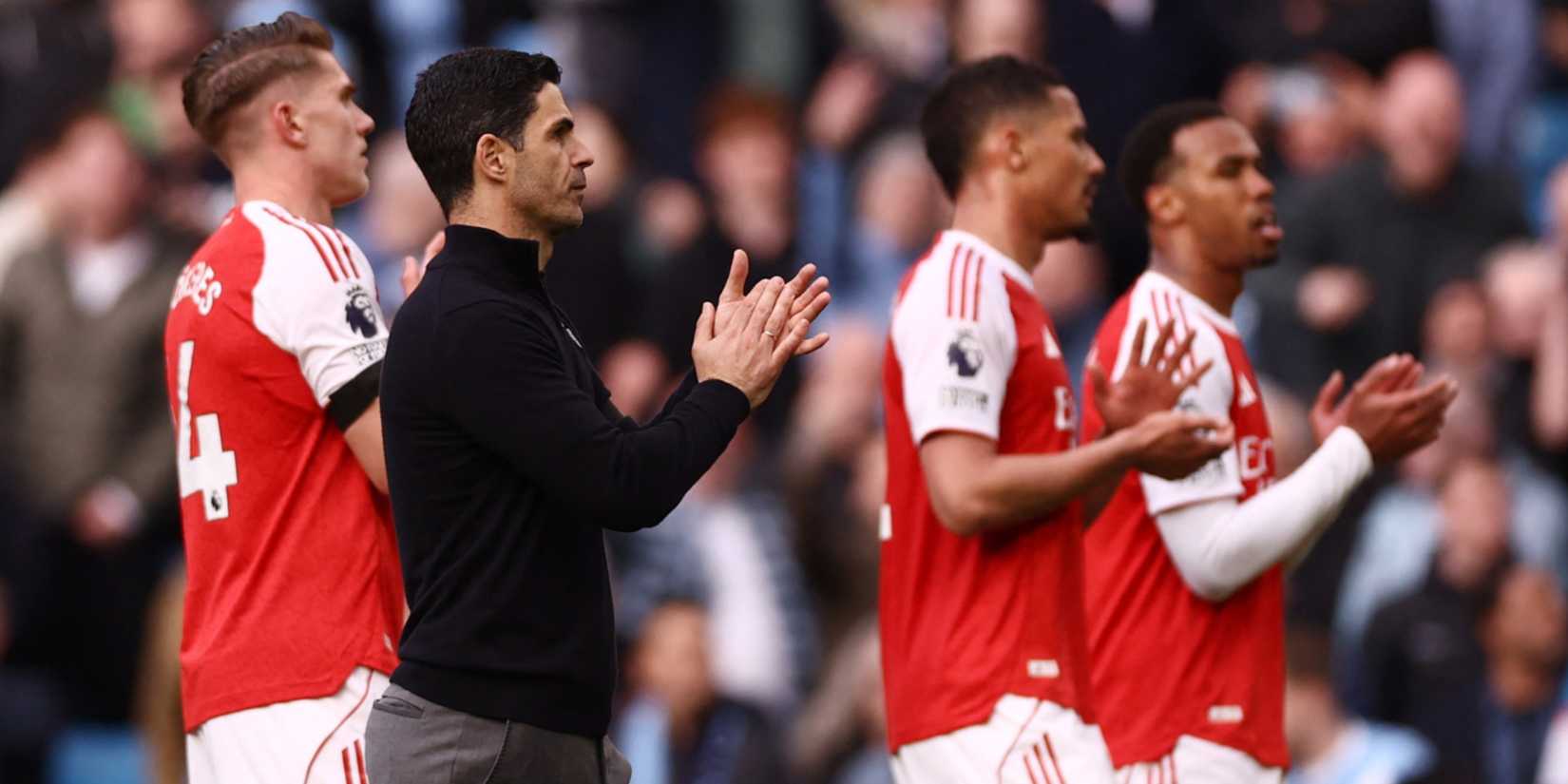Arsenal players and Mikel Arteta at Etihad Stadium