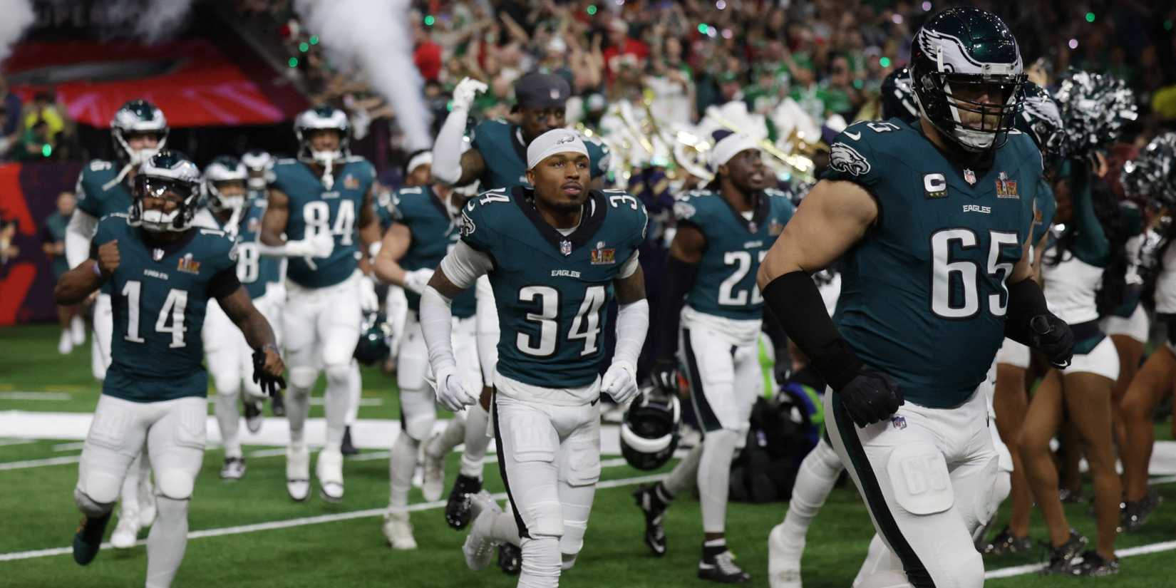 Lane Johnson runs onto the field ahead of Super Bowl LIX
