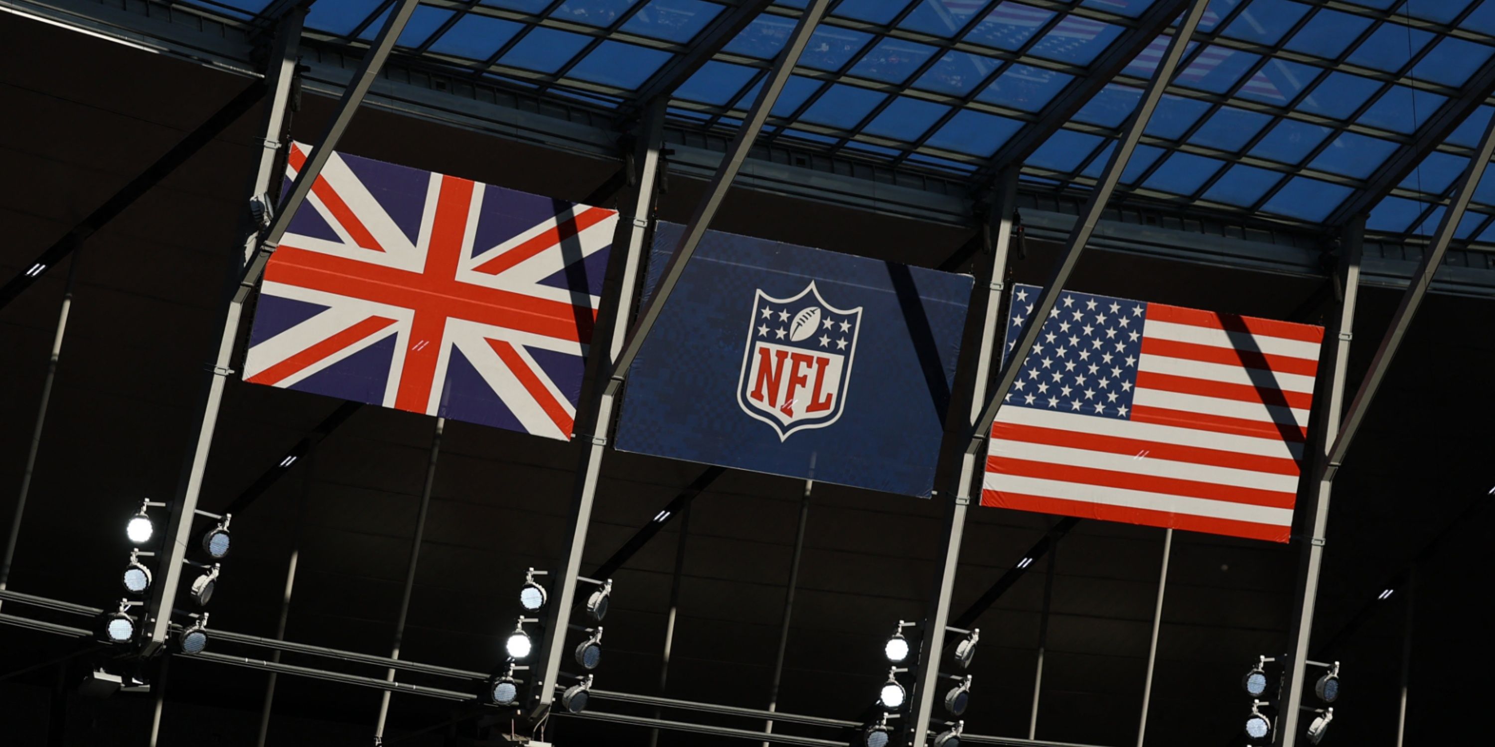 The U.S. and Britain's national flags alongside the NFL logo