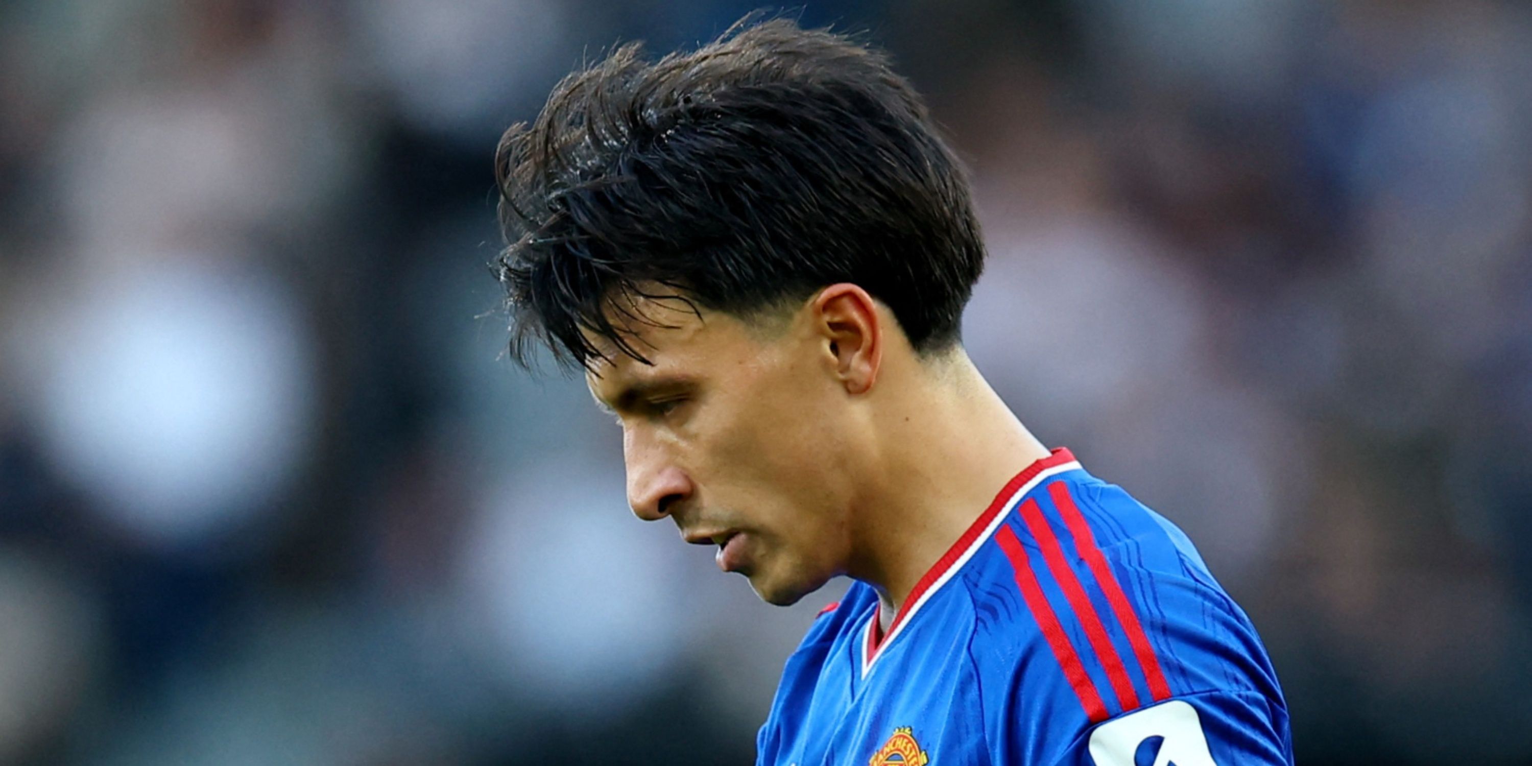 Manchester United's Lisandro Martinez looks down