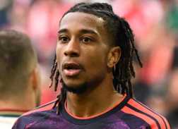Bayern Munich's Michael Olise looks concerned