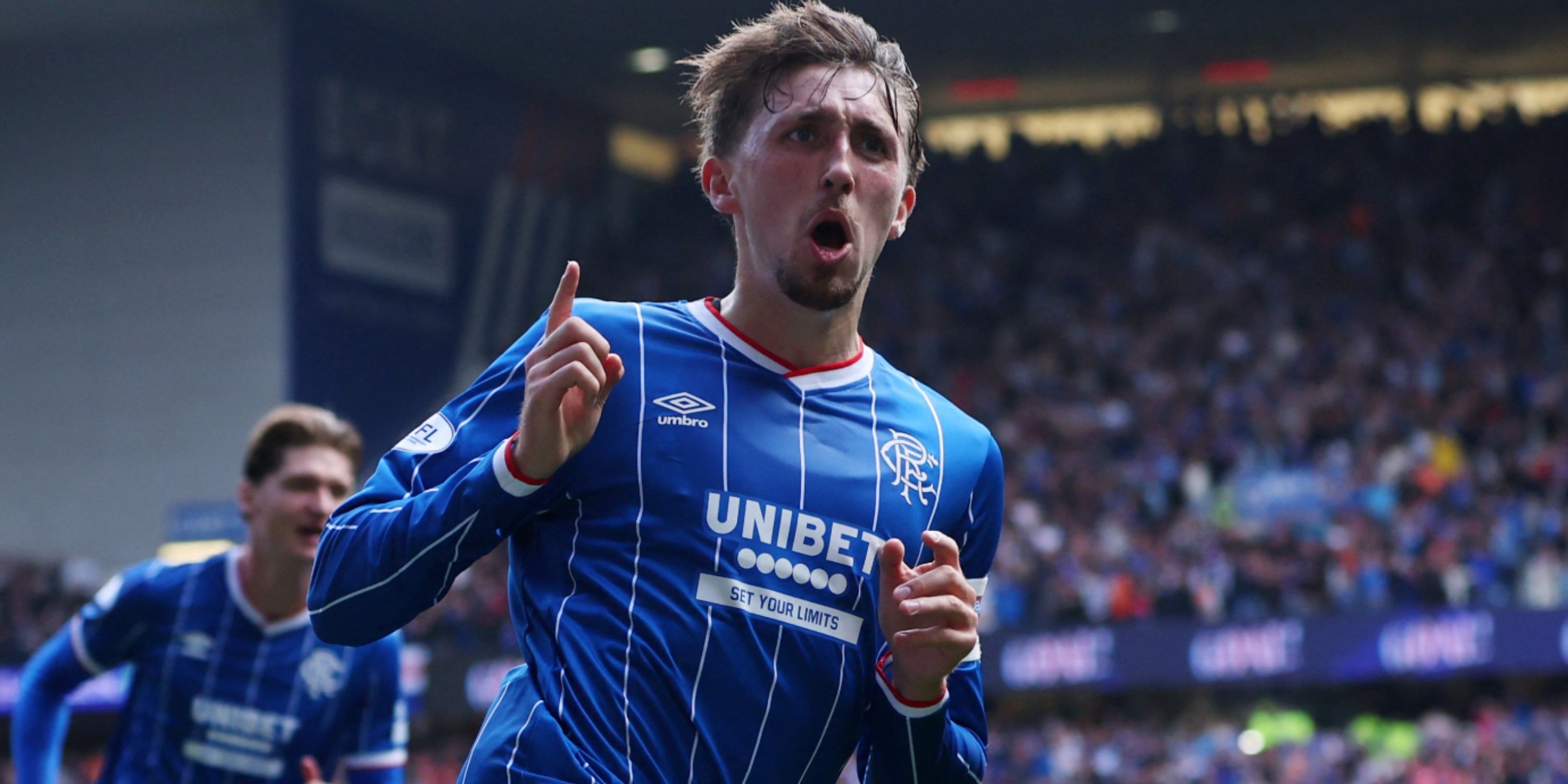 Rangers midfielder Dan Neil celebrates scoring against Celtic