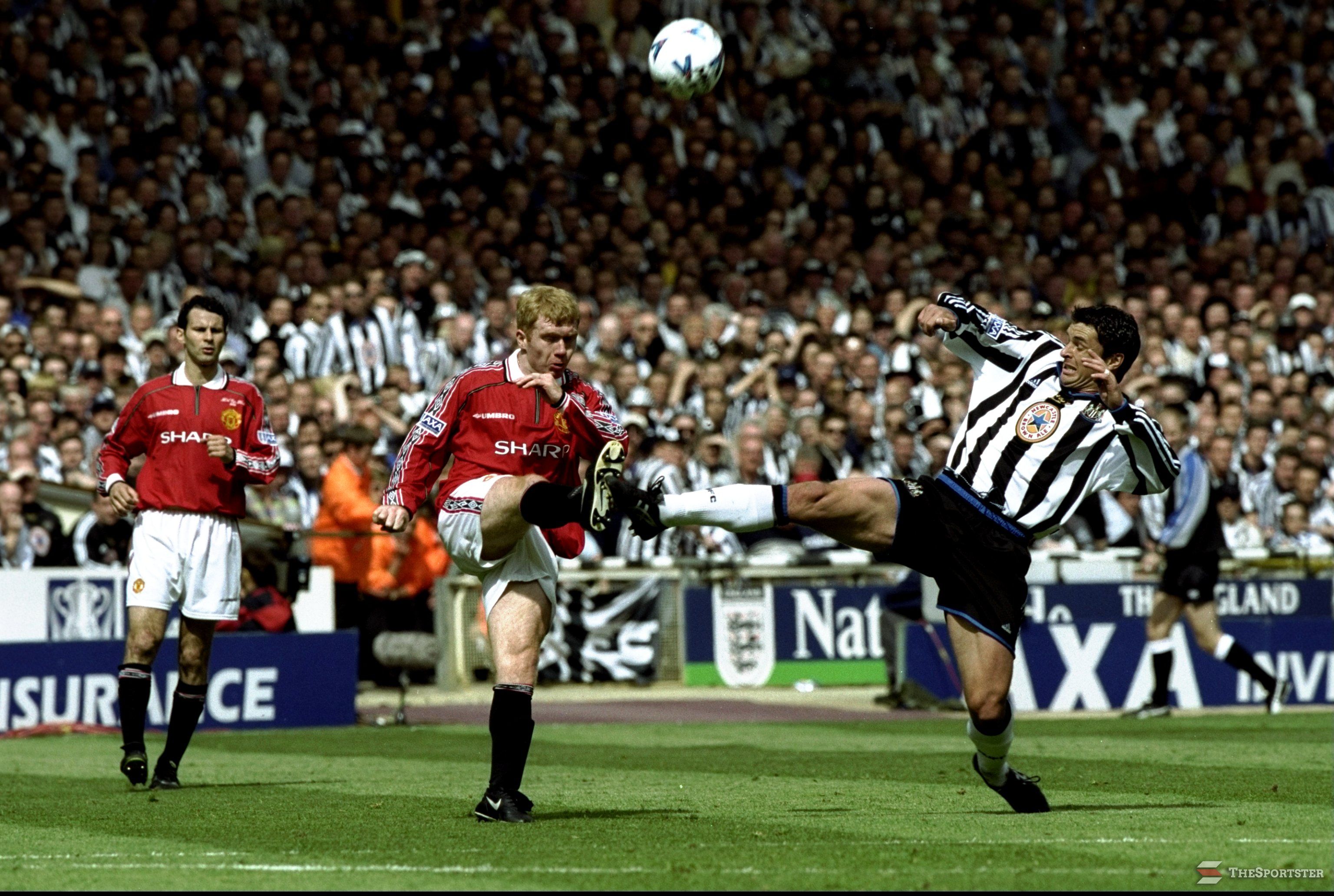22 May 1999: Gary Speed of Newcastle United in action against Paul Scholes of Manchester United during the AXA FA Cup Final match against Manchester United played at Wembley Stadium in London, England. The match finished in a 2-0 win for Manchester United and they completed the "Double" for the third time in six years. \ Mandatory Credit: Clive Brunskill /Allsport